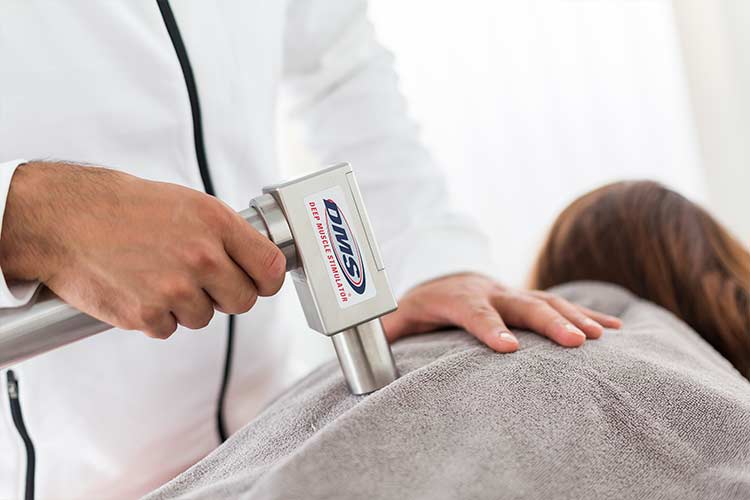 Behandlung mit DMS-Massagegerät